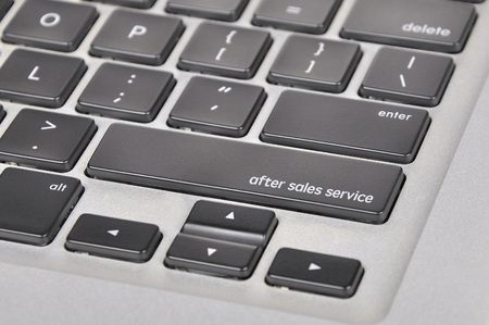 The computer keyboard button written word after sales service.の写真素材