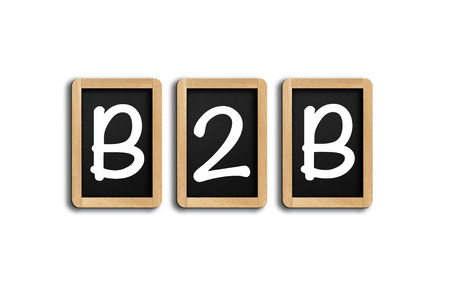 Top view flat lay business to business ( B2B ) marketing on the chalk board on white tableの写真素材