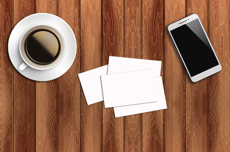 Top view flat lay blank business card, coffee and smart phone with copyspace area.の写真素材