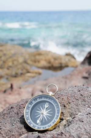 One Compass on the Rocks near the Atlantic Oceanの写真素材