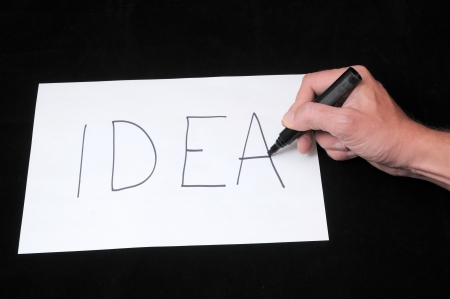 A Caucasian Male Hand Drawing on a White Paperの写真素材