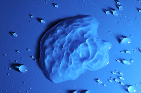 Some Water Drops on a Blue Textured Backgroundの写真素材