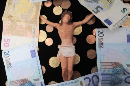Jesus Christ and Money on a Darkの写真素材