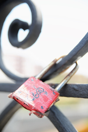 A Colored Metal Lover's Lock on a Bridgeの写真素材