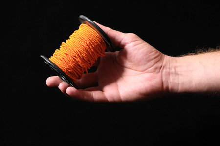 Roll of Twine isolated on a Black Background