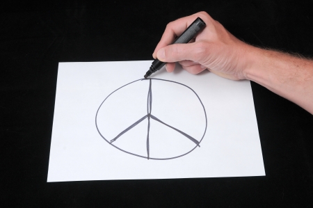 A Caucasian Male Hand Drawing on a White Paperの写真素材