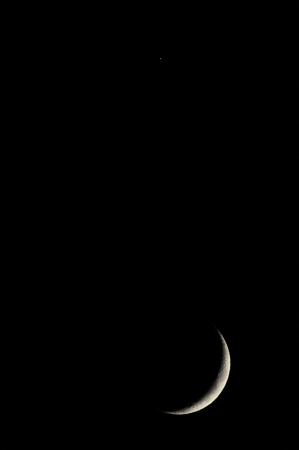 A Very Small Early Moon in the Deep of the Nightの写真素材