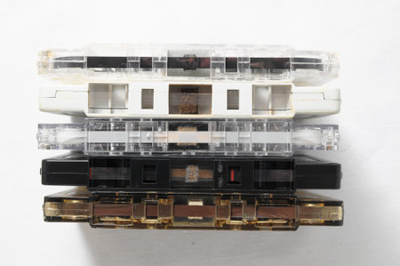 Ancient Vintage Used Musicassette over a White Background