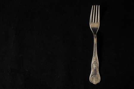 Ancient Vintage Silver 	
Flatware on a Black Backgroundの写真素材