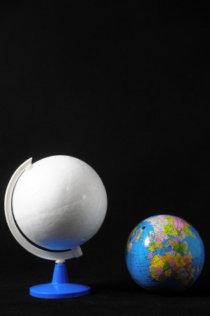 Many Globes Planet Earth on a Black Backgroundの写真素材
