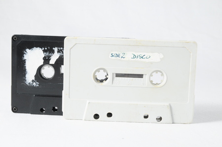 Ancient Vintage Used Musicassette over a White Backgroundの写真素材