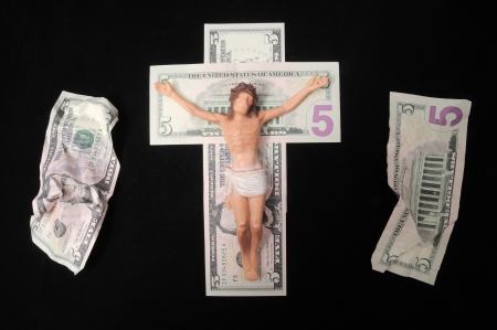 Jesus Christ and Money on a Dark Background - Religion Conceptの写真素材