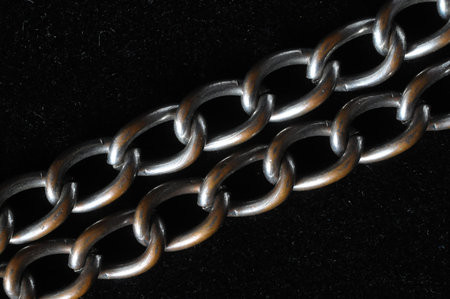 Silver Small Chain Texture on a Black Background