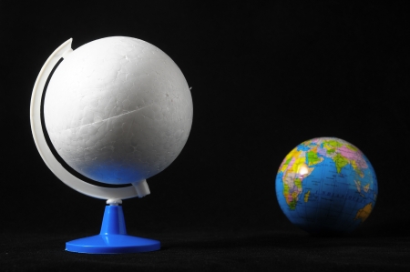 Many Globes Planet Earth on a Black Backgroundの写真素材