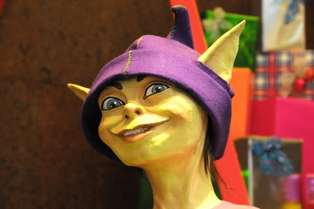 Modern Statue of a Christmas Elf with Giftsの写真素材