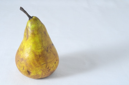 Very Ripe Healthy Pear on a White Backgroundの写真素材
