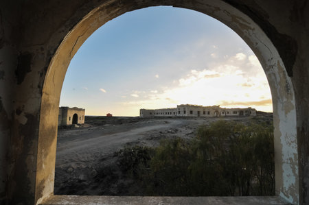 Abandoned Buildings of a Military Base at Sunset
