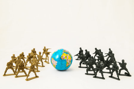 Plastic Lead Soldiers Representing War on a White 