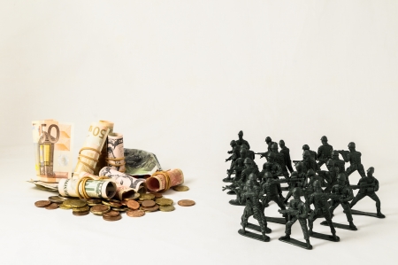 Plastic Lead Soldiers Representing War on a White Backgroundの写真素材