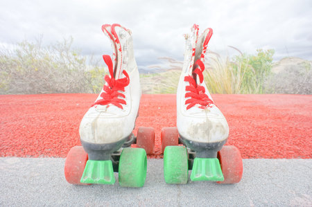 Hdr Picture of Old Vintage White Skate Boot on the Asphalt Sterret