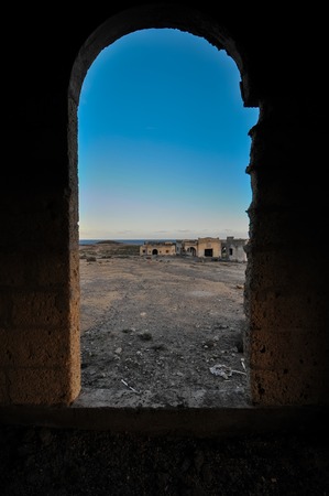 Abandoned Buildings of a Military Base at Sunsetの写真素材