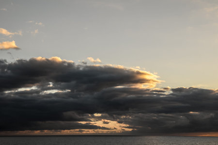 Cloudscape, Colored Clouds at Sunset near the Ocean