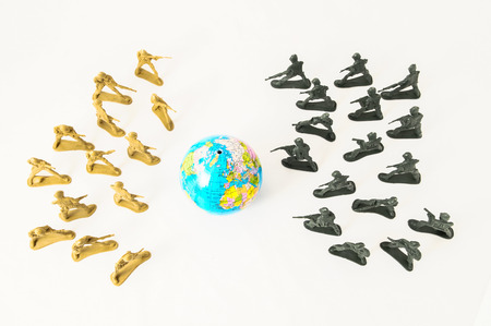 Plastic Lead Soldiers Representing War on a White の写真素材