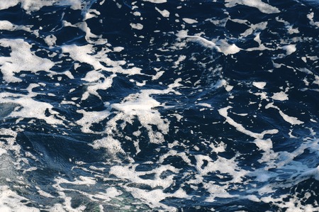 Water Texture Deep Blue Ocean Surface with Wavesの写真素材