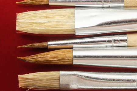 New Wooden Different Paintbrush Set Texture over a Colored Backgroundの写真素材