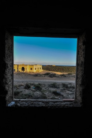 Abandoned Buildings of a Military Base at Sunsetの写真素材