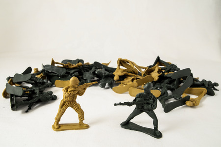 Plastic Lead Soldiers Representing War on a White Backgroundの写真素材
