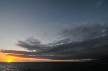 Sun Setting on the Atlantic Ocean in Tenerife Canary Island Spainの写真素材