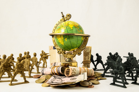 Plastic Lead Soldiers Representing War on a White の写真素材