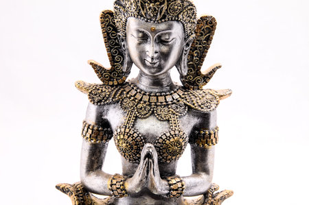 Oriental Asian Statue on a White Backgroundの写真素材