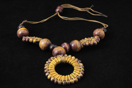 Handmade Wood Collar Necklace on a Black Backgroundの写真素材