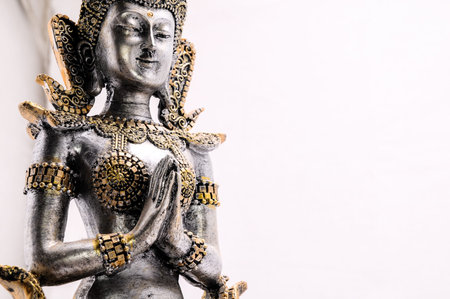 Oriental Asian Statue on a White Background