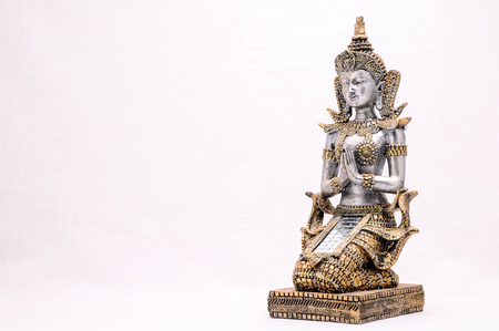 Oriental Asian Statue on a White Backgroundの写真素材