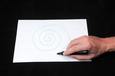 A Caucasian Male Hand Drawing on a White Paperの写真素材