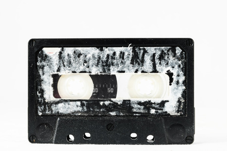 Ancient Vintage Used Musicassette over a White Backgroundの写真素材