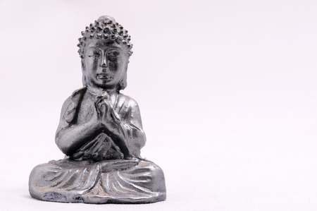 Oriental Asian Statue on a White Backgroundの写真素材