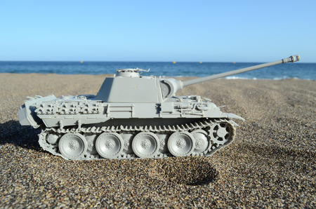 War Concept Gray Tank Model on the Beachの写真素材