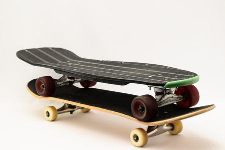 Vintage Style Black Skateboard on a white Backgroundの写真素材