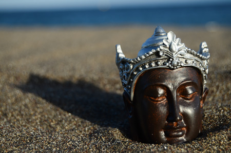 One Ancient Buddha Statue Near The Oceanの写真素材