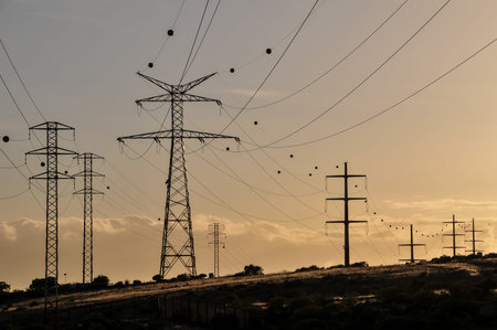 Energy Electricity Power Pylon on a Blue Skyの写真素材
