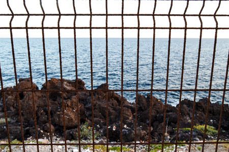 Net over the atlantic ocean at sunsetの写真素材