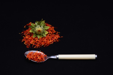 Saffron Flower Spice On a Black Backgroundの写真素材