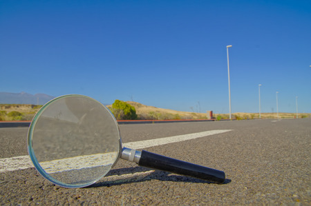 Travel Concept Loupe on the Asphlat Roadの写真素材