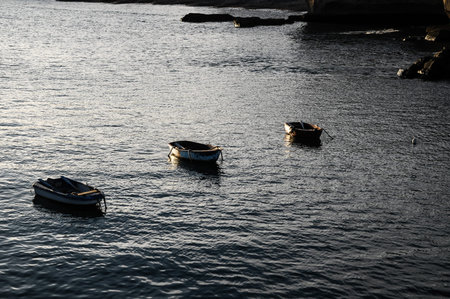 Backlight Silhouette Boats at Sunset in the Atlantic Oceanの写真素材