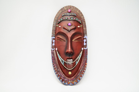 Wooden African Mask on a White Backgroundの写真素材