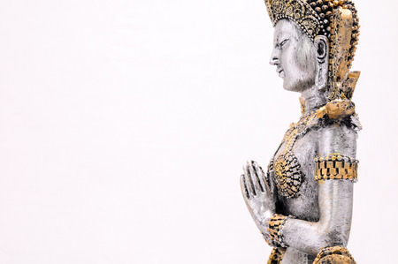 Oriental Asian Statue on a White Backgroundの写真素材